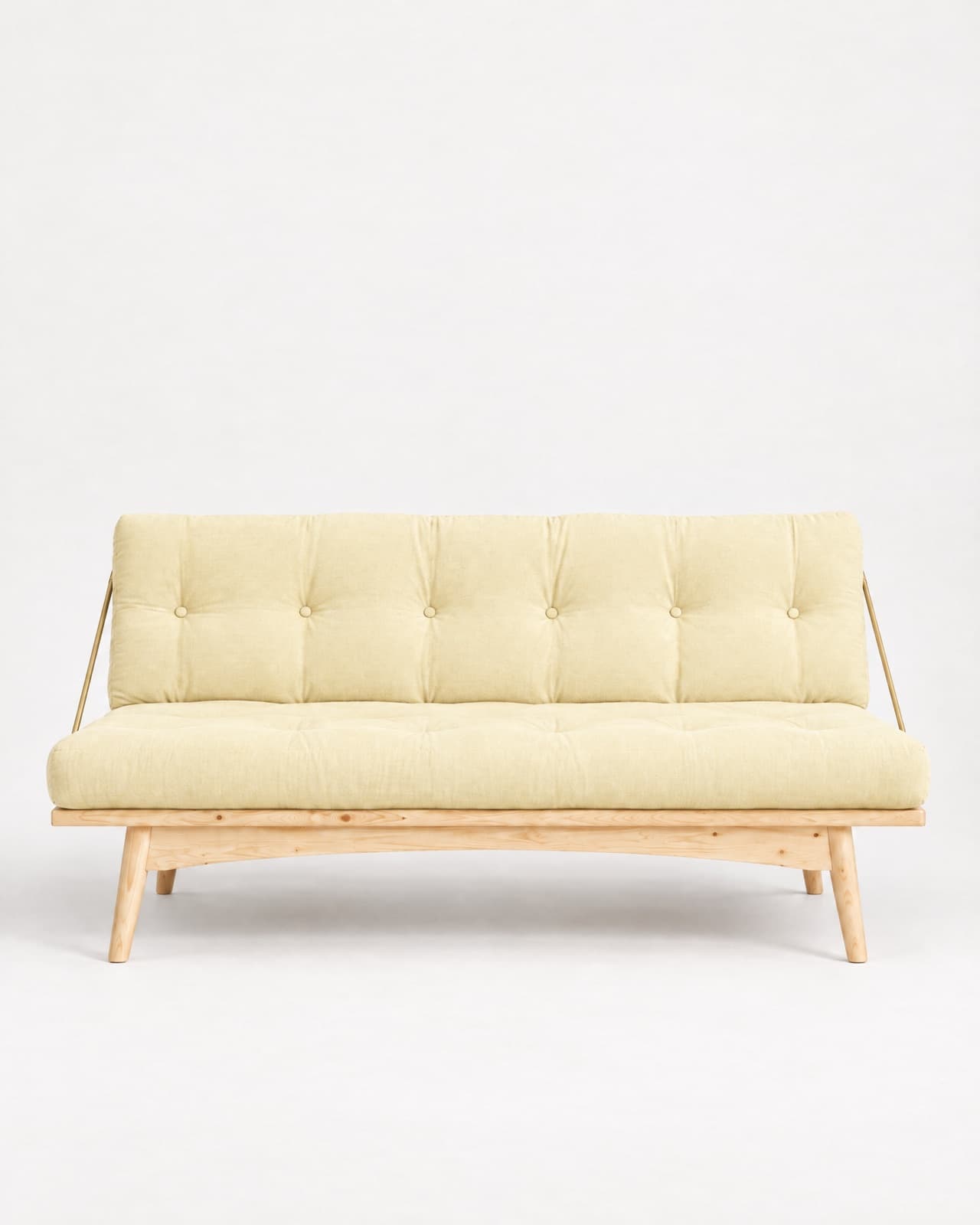 Futon Folk en modo sofá con funda Mantequilla: base de pino claro sobre patas y varillas color latón