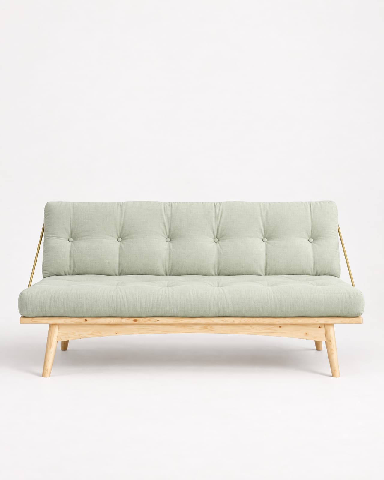 Futon Folk en modo sofá con funda Salvia: base de pino claro sobre patas y brazos color latón